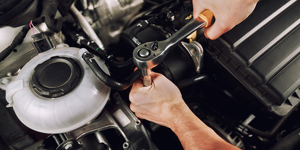 Image Of Vehicle's Engine Being Fix