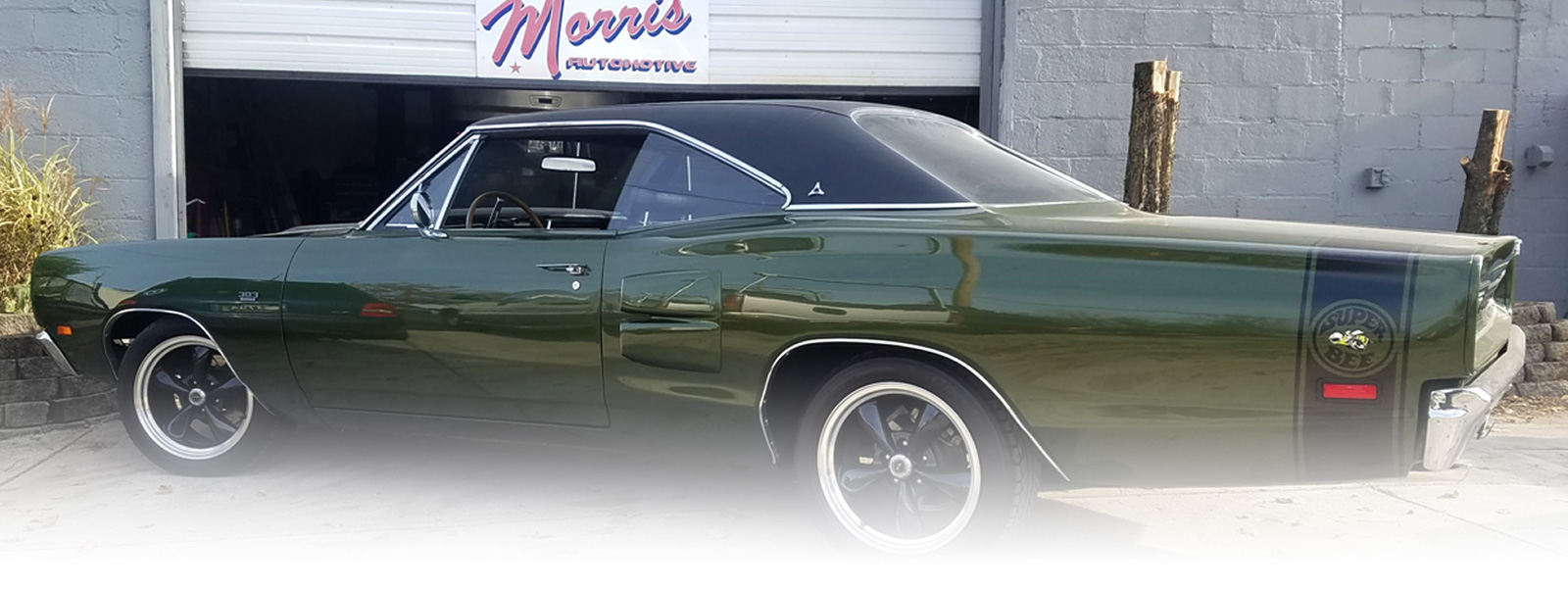 Image Of Vintage/Classic Car Parked At The Store Front